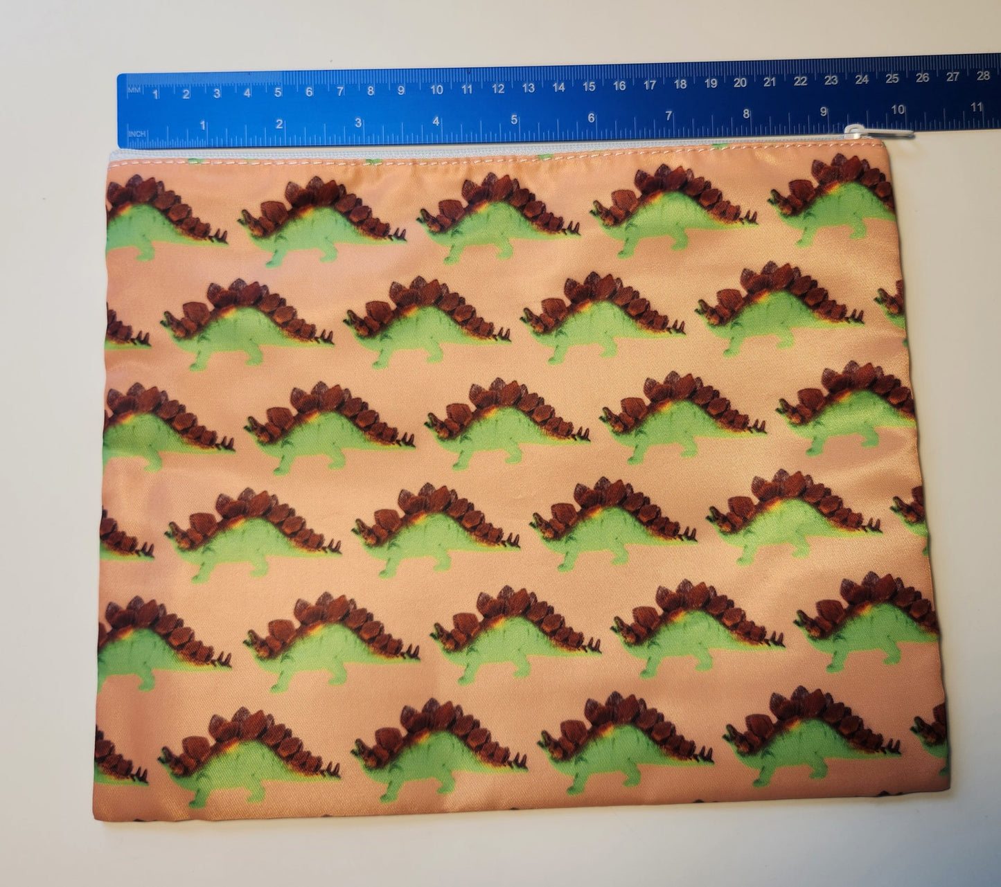 Stego Print XL Zippered Cosmetic or Storage Bag - Dinosaur Makeup Case - Art & School Supplies Organizer - Blue Peach - Stegosaurus